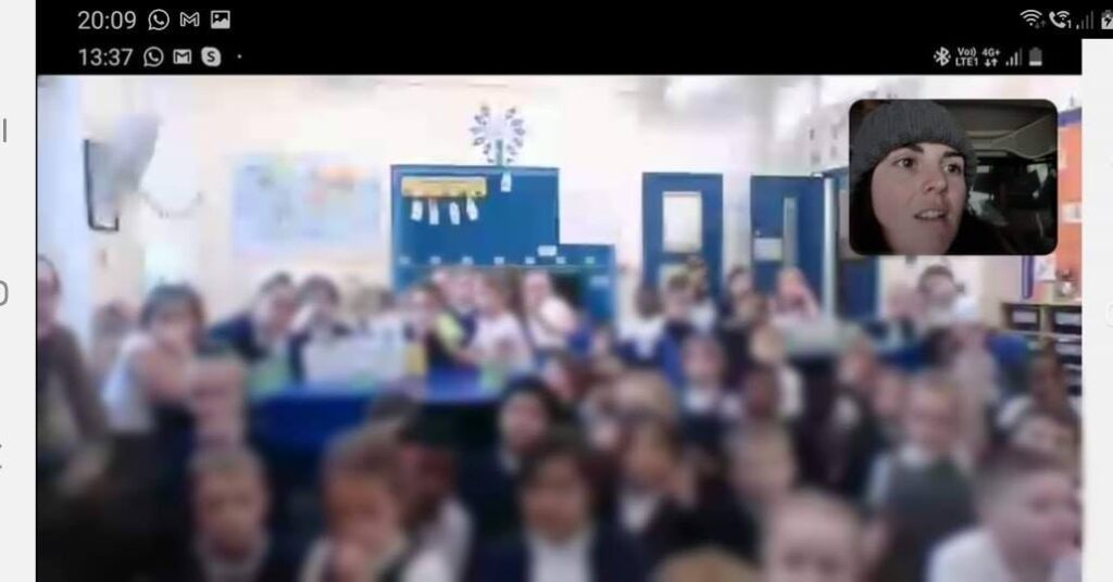 screenshot of a facetime call between a school and a farmer